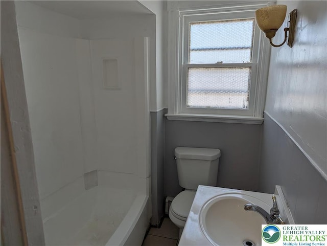 1616 W Tilghman St, Allentown City, PA 18102 - full bath with a sink, toilet, and tile patterned flooring