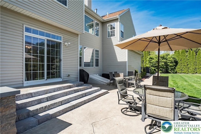 view of patio with outdoor dining space