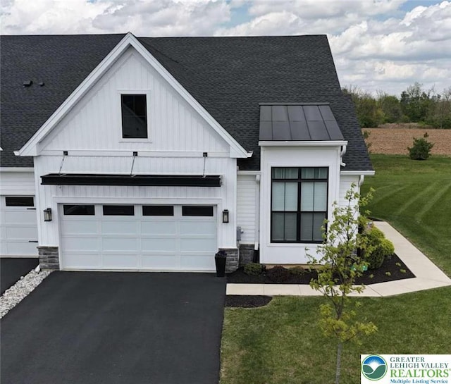 6907 Cedar Dr, East Allen Twp, PA 18014 - modern farmhouse style home with a standing seam roof, board and batten siding, and roof with shingles