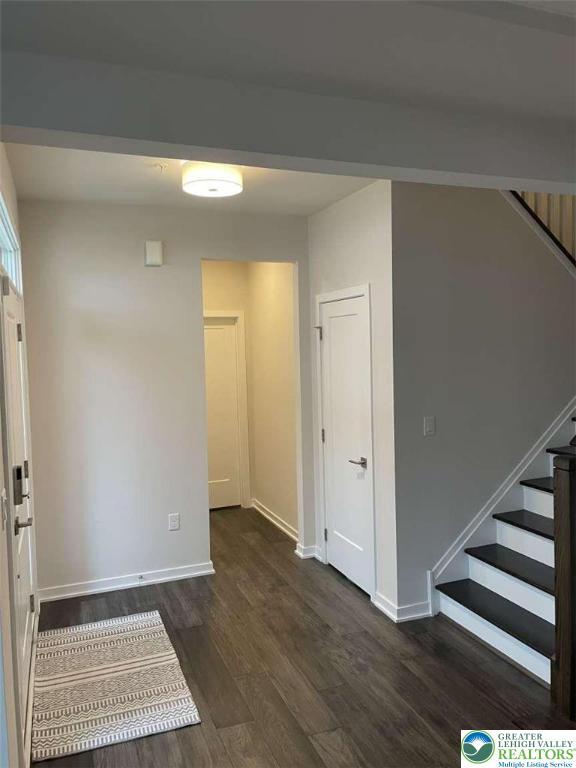 6907 Cedar Dr, East Allen Twp, PA 18014 - entryway with stairs, wood finished floors, and baseboards