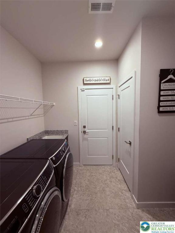 6907 Cedar Dr, East Allen Twp, PA 18014 - laundry room featuring washer and clothes dryer, baseboards, and recessed lighting