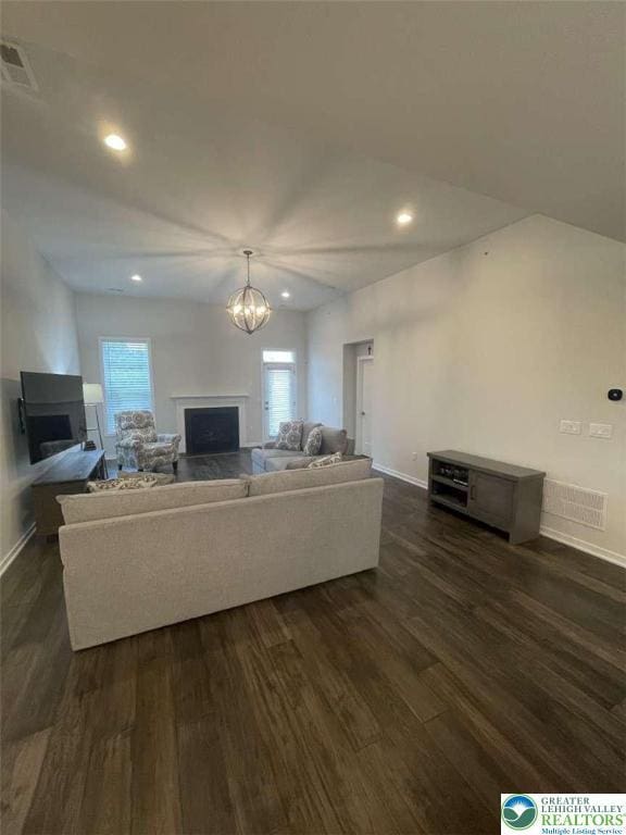 6907 Cedar Dr, East Allen Twp, PA 18014 - living room featuring a fireplace, baseboards, dark wood-style floors, and recessed lighting