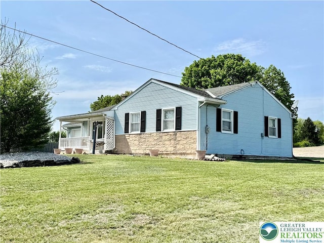 8173 Holbens Valley Rd, Weisenberg Twp, PA 18066 - view of front facade featuring a front yard and stone siding