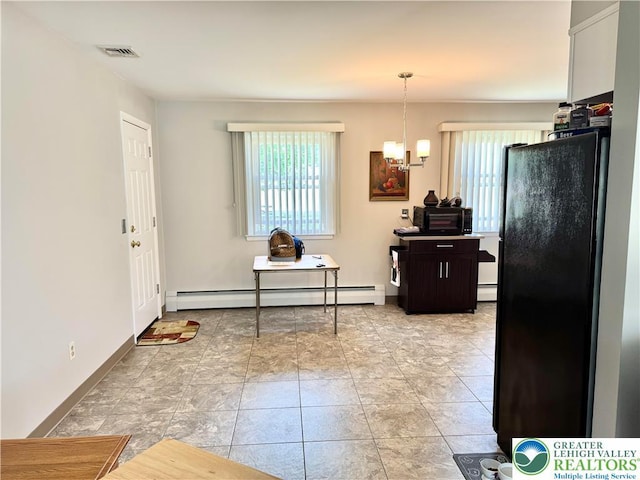 8173 Holbens Valley Rd, Weisenberg Twp, PA 18066 - entryway featuring a baseboard heating unit, a chandelier, and baseboards