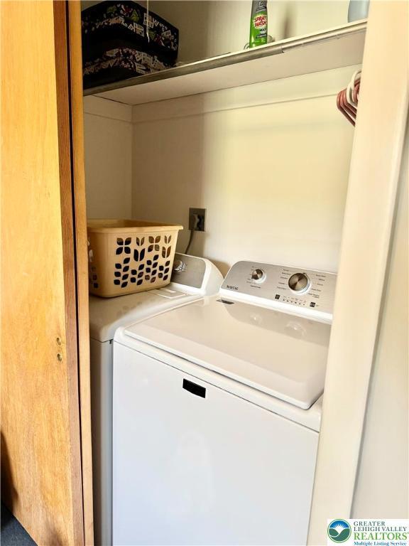 8173 Holbens Valley Rd, Weisenberg Twp, PA 18066 - clothes washing area with independent washer and dryer