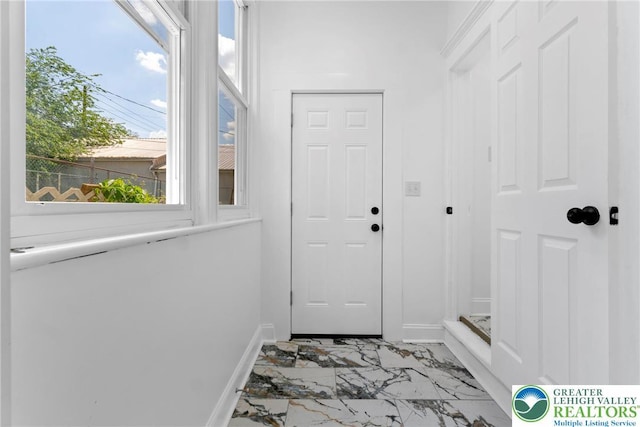 410 E Hamilton St, Allentown City, PA 18109 - doorway with light marble finish flooring and baseboards
