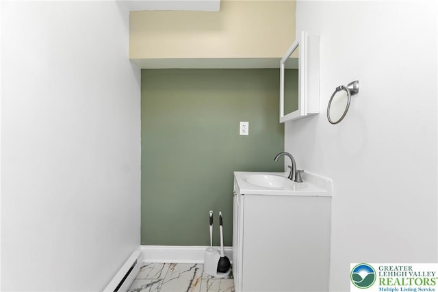 410 E Hamilton St, Allentown City, PA 18109 - bathroom featuring marble finish flooring, vanity, and baseboards
