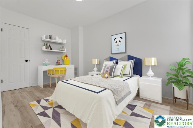 410 E Hamilton St, Allentown City, PA 18109 - bedroom featuring light wood-type flooring and baseboards