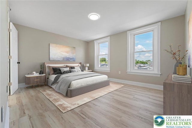 410 E Hamilton St, Allentown City, PA 18109 - bedroom featuring light wood-style floors and baseboards