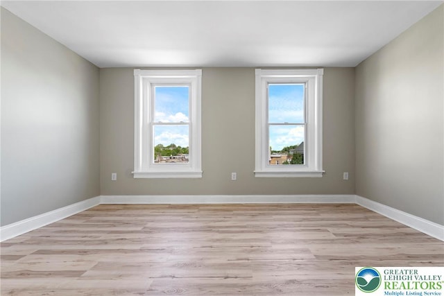 410 E Hamilton St, Allentown City, PA 18109 - empty room with light wood-style flooring, healthy amount of natural light, and baseboards