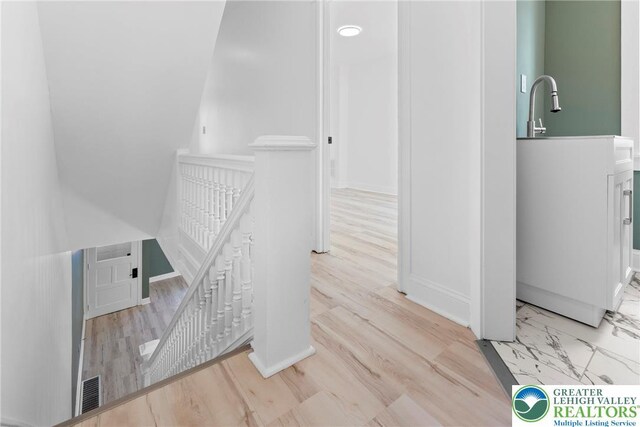 410 E Hamilton St, Allentown City, PA 18109 - corridor featuring an upstairs landing and baseboards