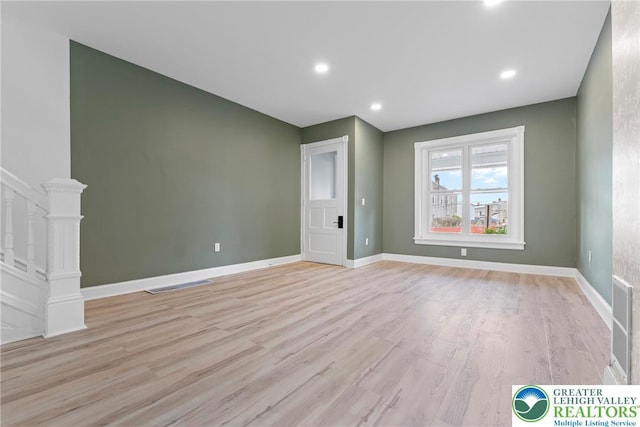 410 E Hamilton St, Allentown City, PA 18109 - unfurnished living room with light wood finished floors, baseboards, stairs, and recessed lighting