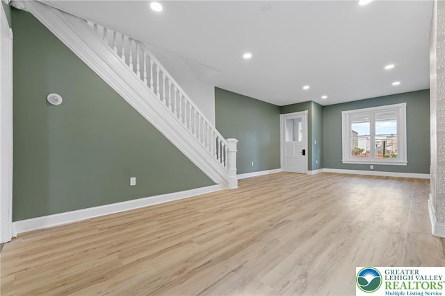 410 E Hamilton St, Allentown City, PA 18109 - unfurnished living room featuring stairs, wood finished floors, baseboards, and recessed lighting