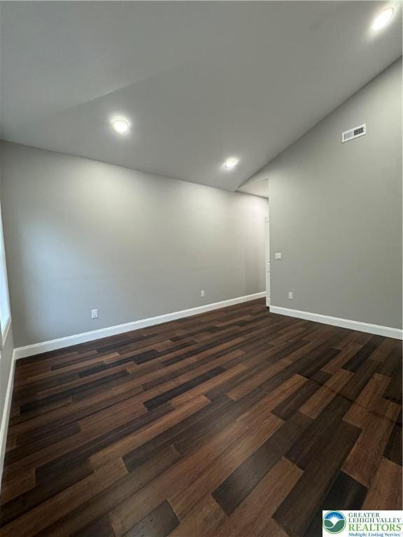 211 Maxatawny Dr, Coolbaugh Twp, PA 18347 - unfurnished room with dark wood-type flooring, baseboards, and recessed lighting