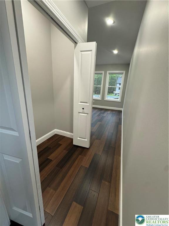 211 Maxatawny Dr, Coolbaugh Twp, PA 18347 - hall featuring dark wood-style floors, baseboards, and recessed lighting