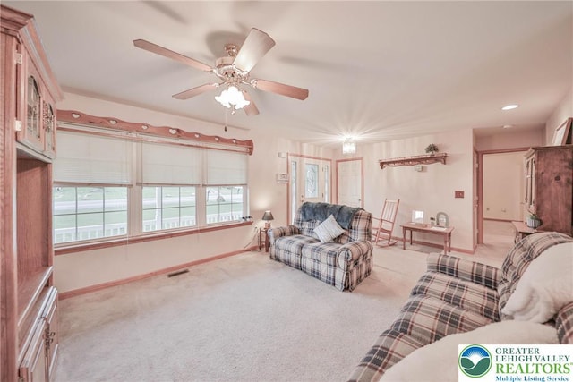 4579 W Mountain View Dr, Lehigh Twp, PA 18088 - carpeted living room featuring a ceiling fan and baseboards