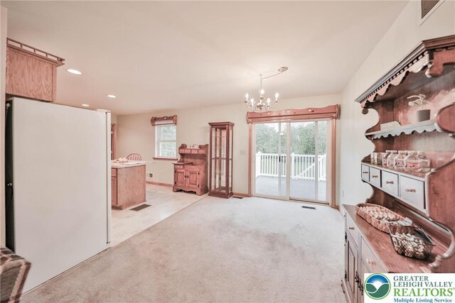 4579 W Mountain View Dr, Lehigh Twp, PA 18088 - sitting room with a chandelier, light colored carpet, and recessed lighting