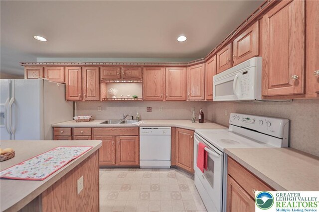 4579 W Mountain View Dr, Lehigh Twp, PA 18088 - kitchen featuring white appliances, a sink, light countertops, recessed lighting, and light floors