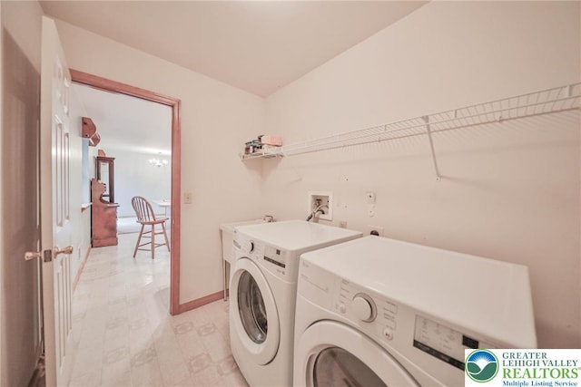 4579 W Mountain View Dr, Lehigh Twp, PA 18088 - laundry room with washer and dryer, light floors, and baseboards