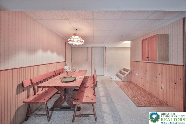 4579 W Mountain View Dr, Lehigh Twp, PA 18088 - carpeted dining area with wood walls and wainscoting