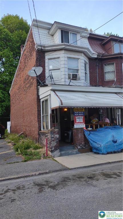 107 Rowe St Unit A, Tamaqua Borough, PA 18252 - view of front of property with brick siding