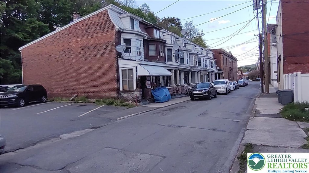 107 Rowe St Unit A, Tamaqua Borough, PA 18252 - view of asphalt road with sidewalks and curbs
