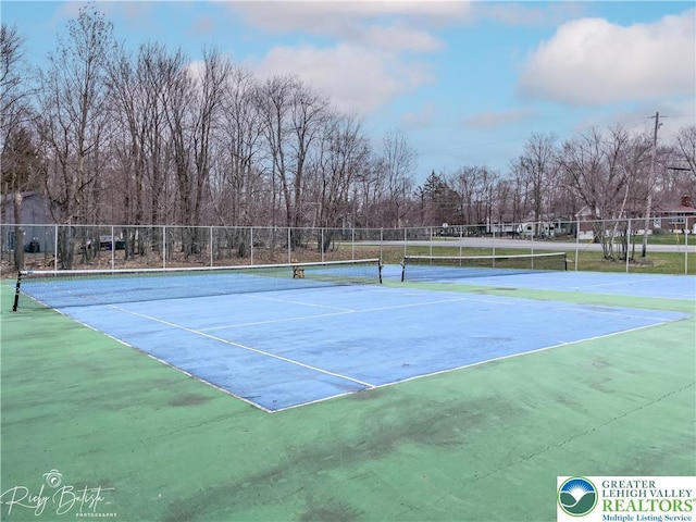 1918 Horseshoe, Coolbaugh Twp, PA 18466 - view of tennis court with fence and view of scattered trees