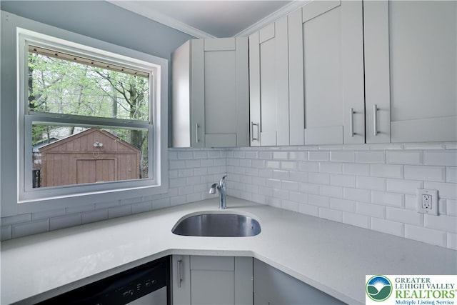 1918 Horseshoe, Coolbaugh Twp, PA 18466 - kitchen with a sink, light countertops, tasteful backsplash, and stainless steel dishwasher