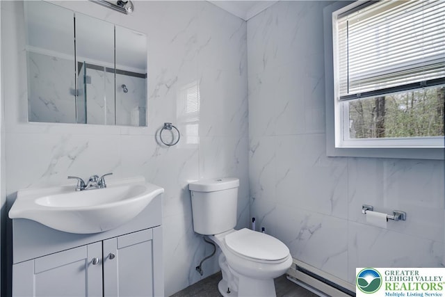 1918 Horseshoe, Coolbaugh Twp, PA 18466 - bathroom featuring baseboard heating, tile walls, plenty of natural light, toilet, and vanity