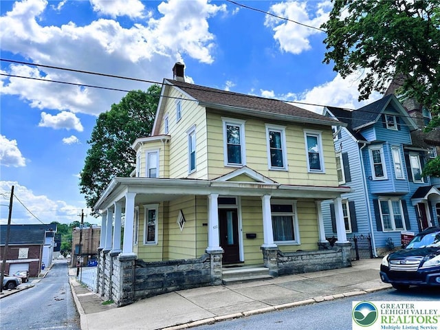 520 2nd St, Catasauqua Borough, PA 18032 - view of front facade featuring a chimney and a porch