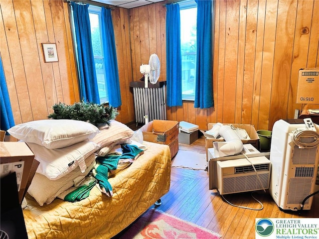 520 2nd St, Catasauqua Borough, PA 18032 - bedroom featuring wood walls and hardwood / wood-style floors