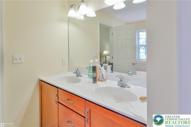 full bath featuring double vanity