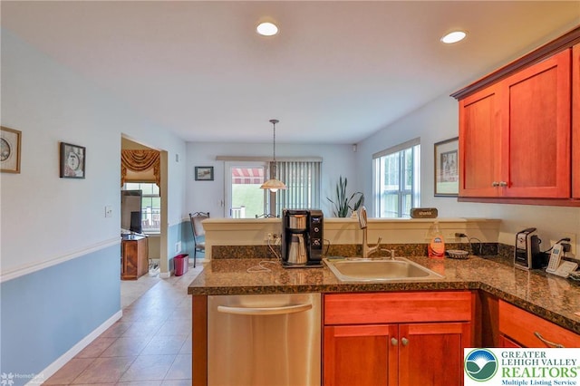 kitchen with a sink, dishwasher, a peninsula, recessed lighting, and light tile patterned floors