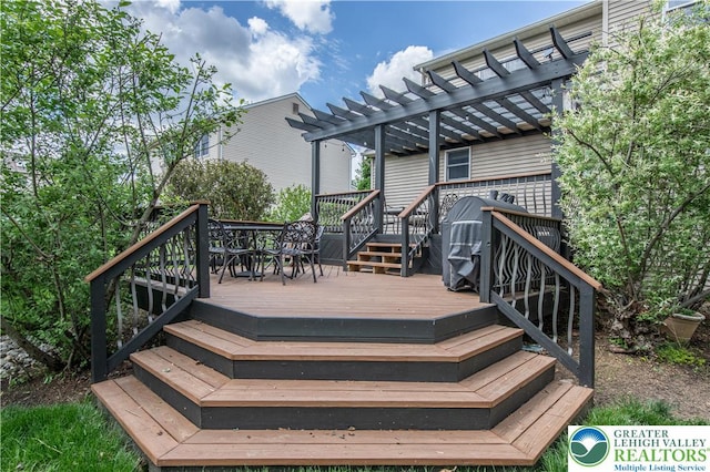 deck with a pergola and stairway