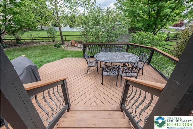 deck with outdoor dining space