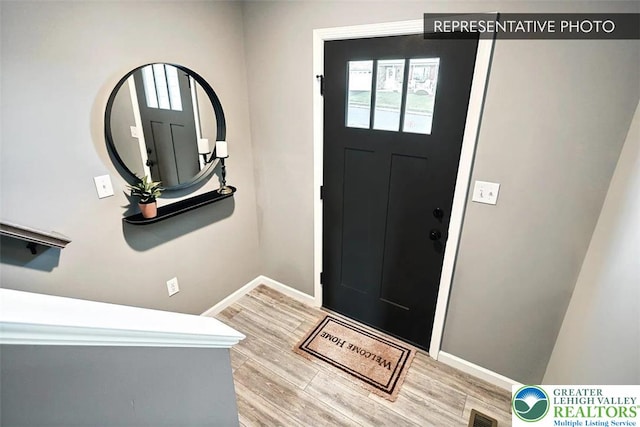 3280 Tepes Dr Unit 152, Allen Twp, PA 18067 - foyer featuring baseboards and light wood-style flooring