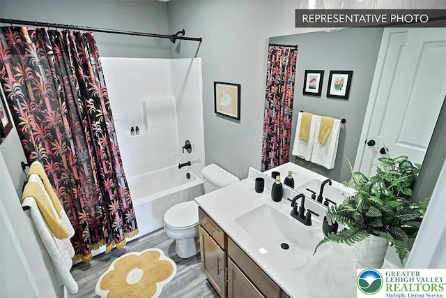 3280 Tepes Dr Unit 152, Allen Twp, PA 18067 - bathroom featuring toilet, wood finished floors, vanity, and shower / tub combo with curtain