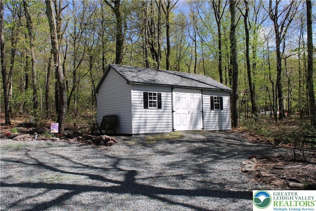 view of outbuilding with an outdoor structure