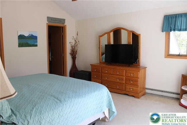 bedroom featuring a baseboard radiator, light carpet, and lofted ceiling