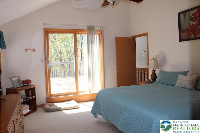 bedroom featuring vaulted ceiling, carpet flooring, and ceiling fan