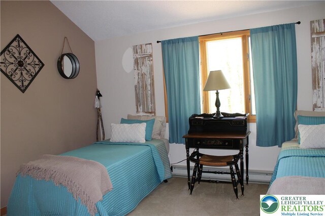 bedroom with a baseboard heating unit