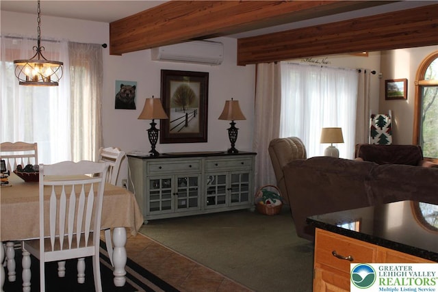 dining area with a wall mounted AC, tile patterned flooring, and a chandelier