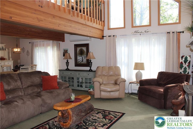 living area with a wall mounted AC, carpet floors, a chandelier, beam ceiling, and a high ceiling
