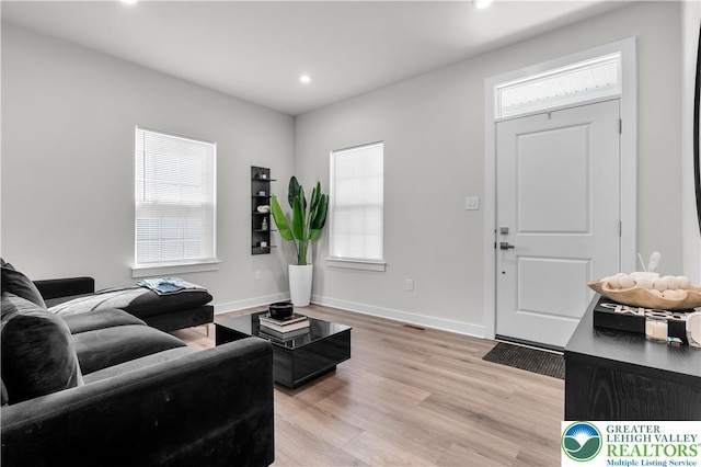 8202 Young Blvd, Upper Macungie Twp, PA 18051 - living room featuring recessed lighting, light wood-style floors, plenty of natural light, and baseboards