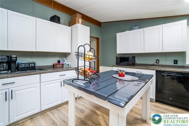 kitchen with black appliances, light wood-type flooring, white cabinets, and dark countertops