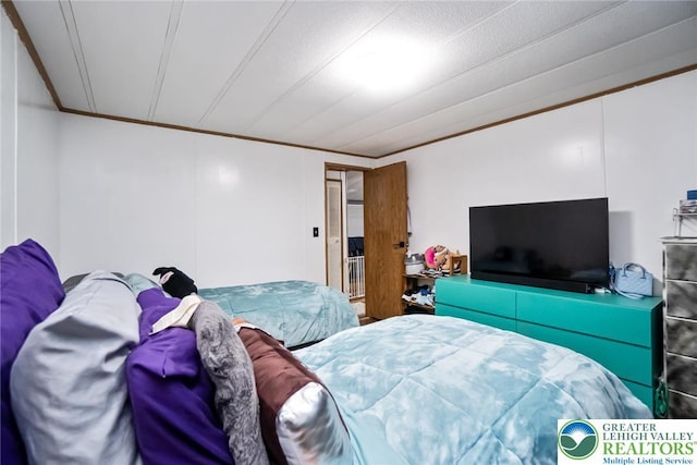 bedroom featuring ornamental molding
