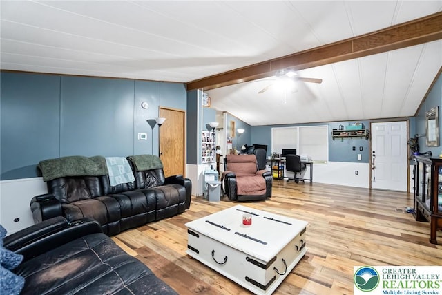 living room featuring wood finished floors, a desk, and a ceiling fan
