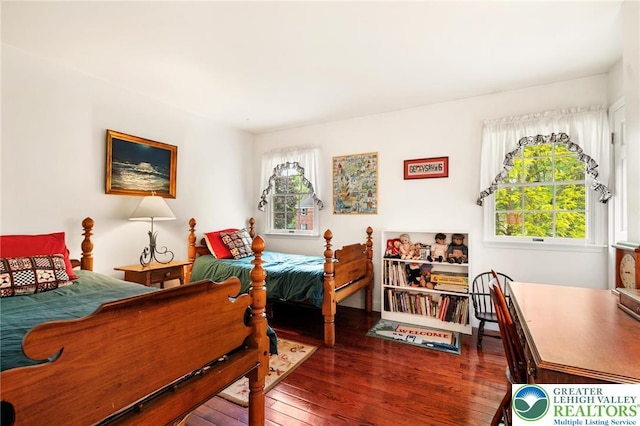 bedroom featuring wood-type flooring