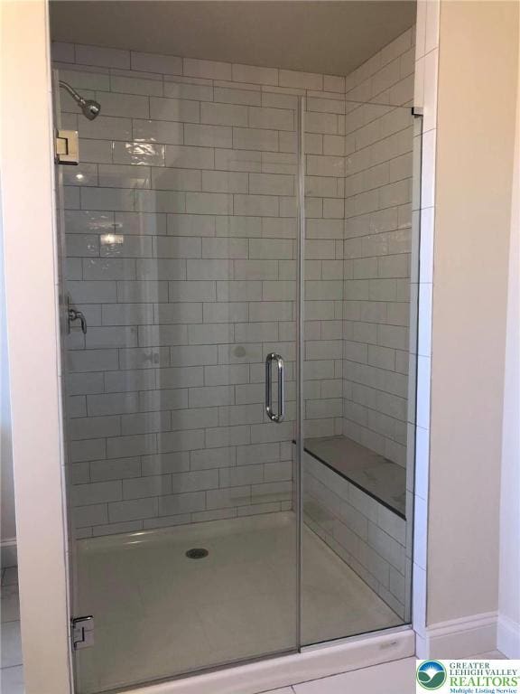 65 Island Ct, Williams Twp, PA 18042 - bathroom with a shower stall and baseboards