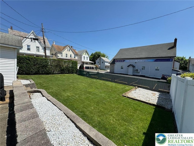 view of yard with a residential view